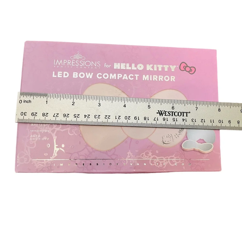 Hello Kitty pictures temperature mirror